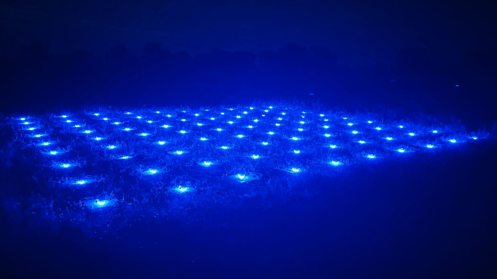 AeroSpark drone fleet glowing blue